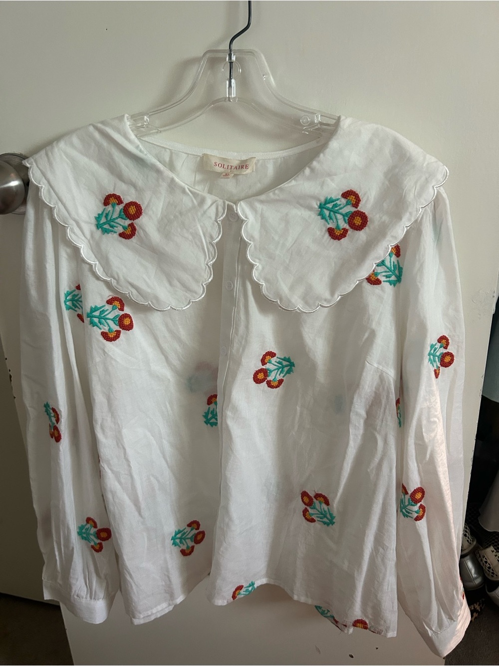 Solitaire White Blouse with Red & Teal Floral Embroidery